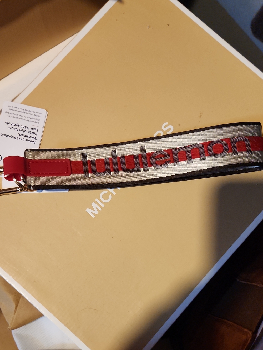 lululemon athletica Red and Gold Never Lost Key Chain